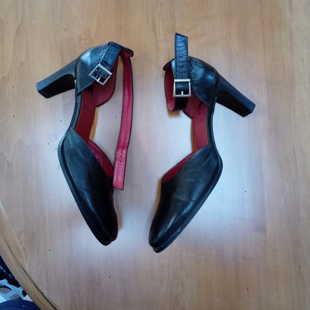 Black high heel ankle strap shoe